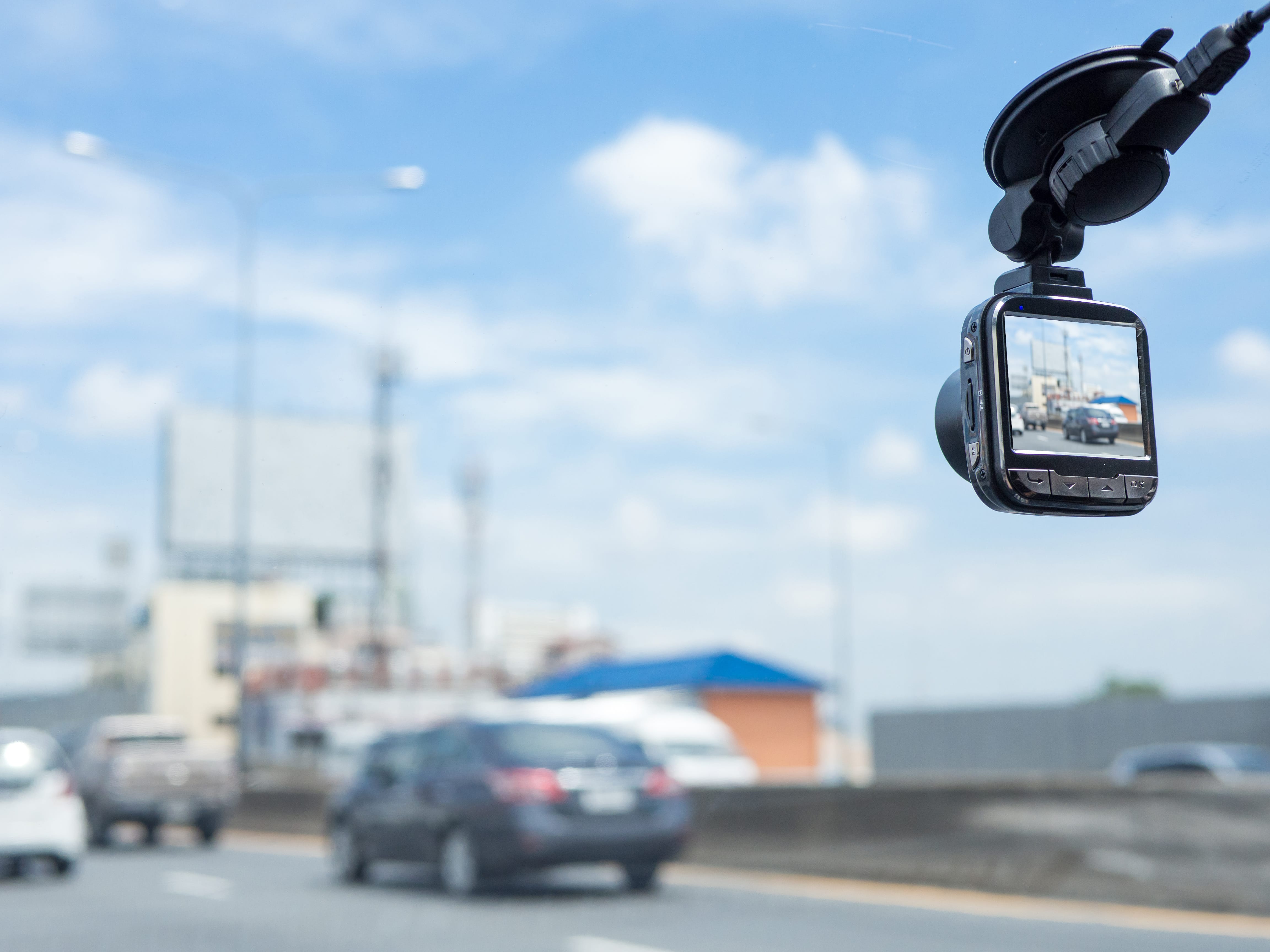 A dash cam recording the road in front.